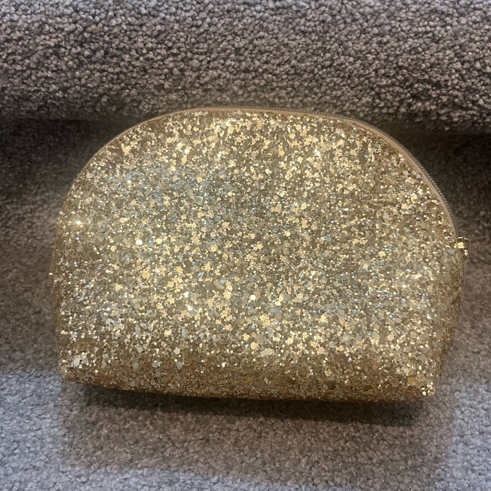 Gold makeup bag